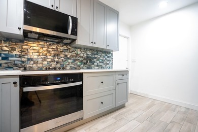 Welcome to this charming 3-bedroom, 2-bath single-family home in - photo 6
