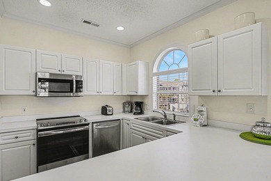 Welcome to this beautifully maintained 2-bedroom, 2-bath condo