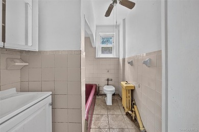 Solid brick home offering endless potential! Features include a - photo 13