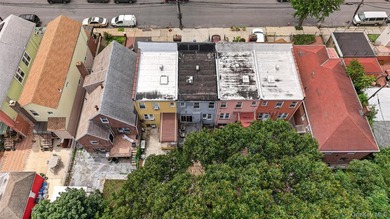Solid brick home offering endless potential! Features include a - photo 23