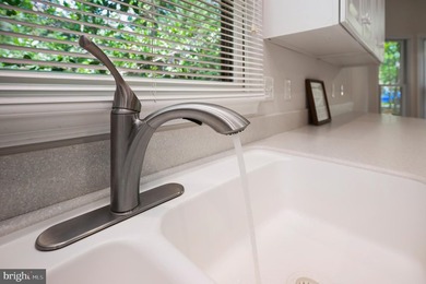 Tucked in the cul-de-sac & sitting on a wooded lot give this - photo 23