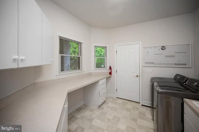 Tucked in the cul-de-sac & sitting on a wooded lot give this - photo 37
