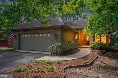 Tucked in the cul-de-sac & sitting on a wooded lot give this - photo 44