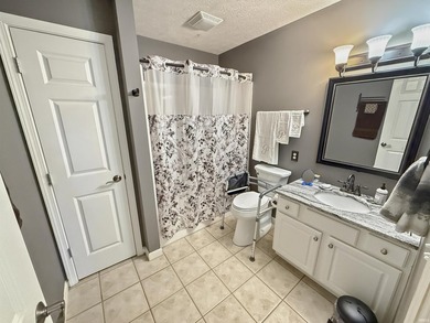 Check out this all brick home located near the golf course in - photo 11