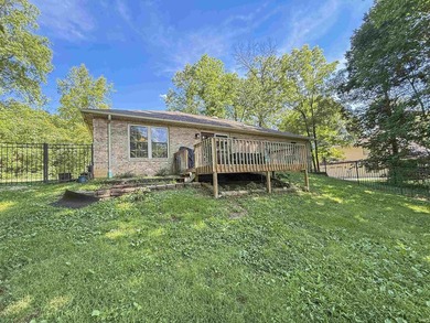 Check out this all brick home located near the golf course in - photo 13