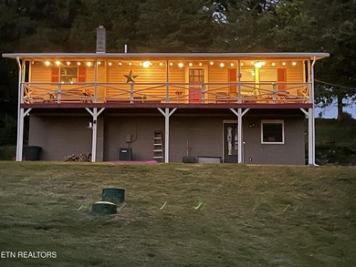 Welcome to this inviting basement ranch home nestled on a - photo 2
