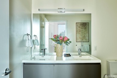 Situated on the 11th floor, this luminous two-bedroom, two-bath - photo 13