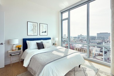 Situated on the 11th floor, this luminous two-bedroom, two-bath - photo 16
