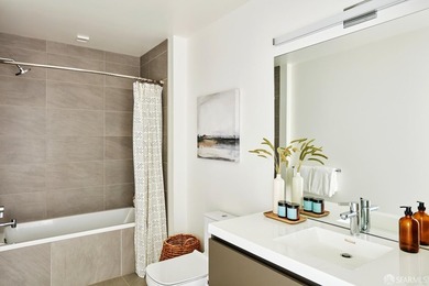 Situated on the 11th floor, this luminous two-bedroom, two-bath - photo 18