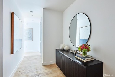 Situated on the 11th floor, this luminous two-bedroom, two-bath - photo 19