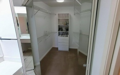 This spacious 2-bedroom, 2-bathroom penthouse condo offers - photo 7