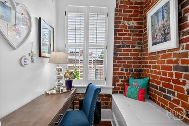 Perched above one of Savannah's most picturesque streets, this - photo 22