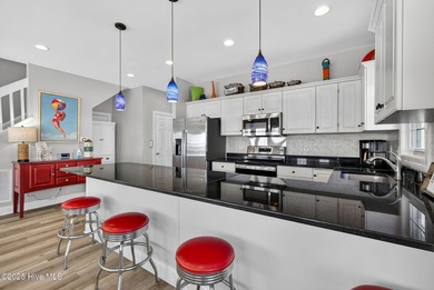 Welcome to this beautifully maintained oceanfront duplex in the