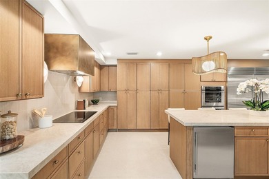 Nestled on a quiet cul-de-sac within the prestigious Seagate - photo 3