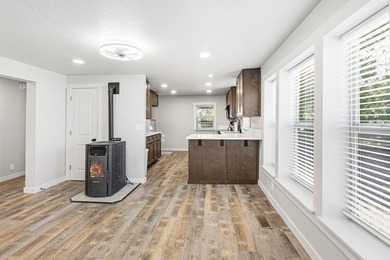 PERFECT IN-TOWN LOCATION! This completely remodeled home sits on - photo 8