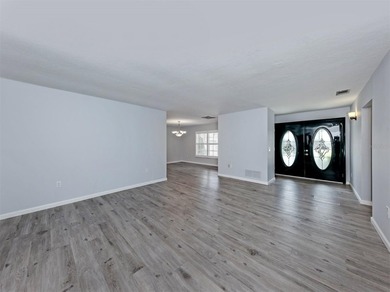 Welcome to this quaint and charming four-bedroom, three-bath - photo 3