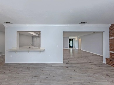 Welcome to this quaint and charming four-bedroom, three-bath - photo 5
