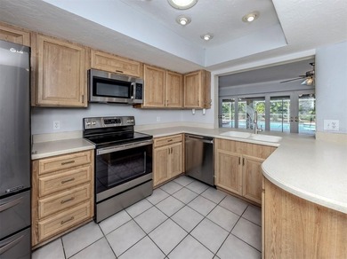 Welcome to this quaint and charming four-bedroom, three-bath - photo 7