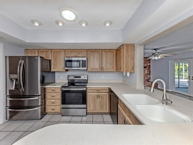 Welcome to this quaint and charming four-bedroom, three-bath - photo 8