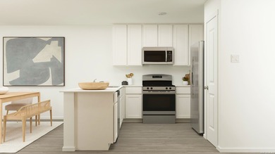 The Hoffman - This single-level home showcases a spacious open - photo 14