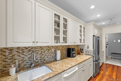Location & Luxury! Welcome to 'The Windsor' at 21 Barstow - one - photo 18
