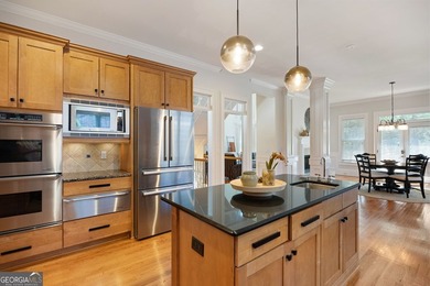 Nestled behind the gates of prestigious Haynes Manor, one of - photo 19