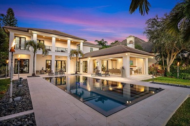Nestled on nearly one acre of pristine riverfront, this - photo 4