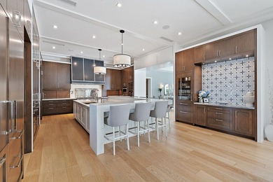 Nestled on nearly one acre of pristine riverfront, this - photo 9