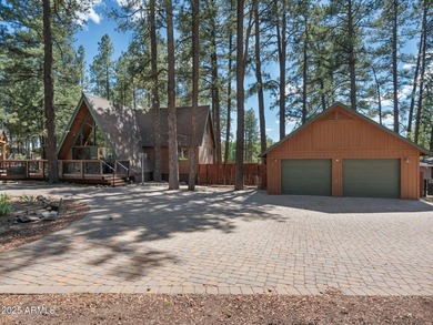 Nestled among towering pines on two combined lots totaling over - photo 2