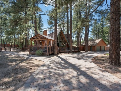 Nestled among towering pines on two combined lots totaling over - photo 3