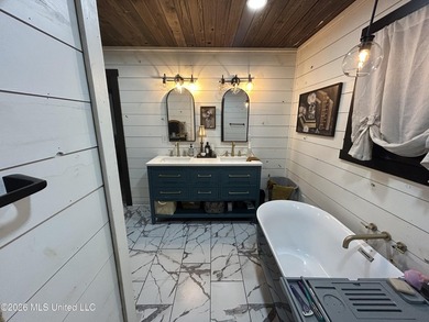 Welcome to this charming 3-bedroom, 2-bath farmhouse retreat - photo 23