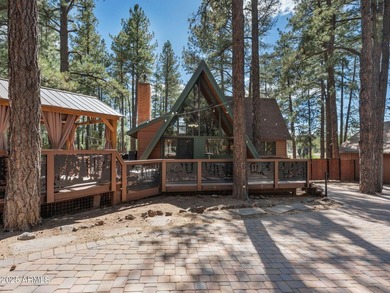 Nestled among towering pines on two combined lots totaling over - photo 4
