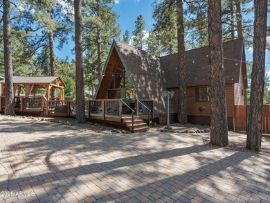 Nestled among towering pines on two combined lots totaling over - photo 5
