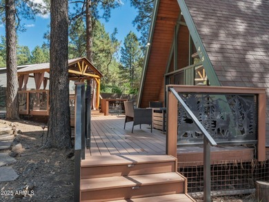 Nestled among towering pines on two combined lots totaling over - photo 6