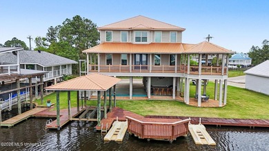 Tucked away in the serene waterfront community of Jourdan River - photo 1