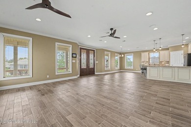 Tucked away in the serene waterfront community of Jourdan River - photo 5