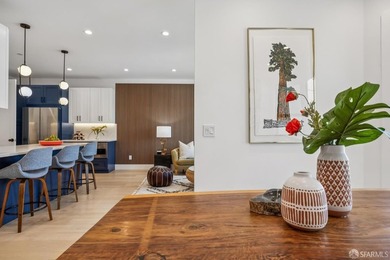 Thoughtfully renovated in 2023, this exceptional bi-level upper - photo 11
