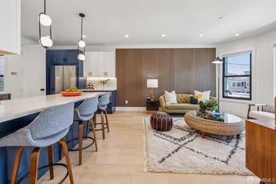 Thoughtfully renovated in 2023, this exceptional bi-level upper - photo 13