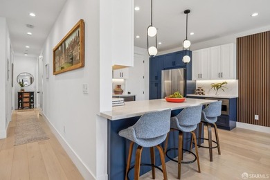 Thoughtfully renovated in 2023, this exceptional bi-level upper - photo 18
