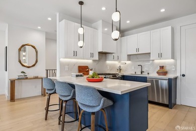 Thoughtfully renovated in 2023, this exceptional bi-level upper - photo 19