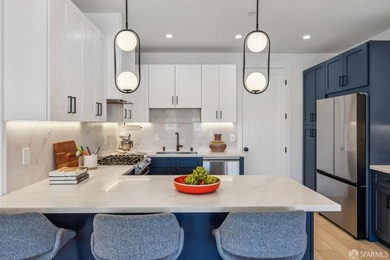 Thoughtfully renovated in 2023, this exceptional bi-level upper - photo 20