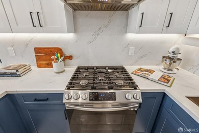 Thoughtfully renovated in 2023, this exceptional bi-level upper - photo 23
