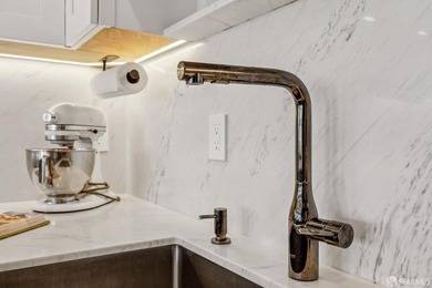Thoughtfully renovated in 2023, this exceptional bi-level upper - photo 25