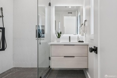 Thoughtfully renovated in 2023, this exceptional bi-level upper - photo 39
