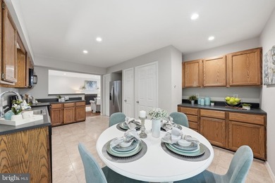 Welcome home to this spacious three-level single-family home - photo 11