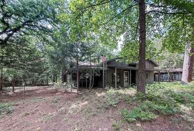Tucked among the tall trees on beautiful Lake Franklin in the - photo 23