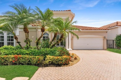 Nestled within the prestigious Woodfield Country Club, this - photo 1