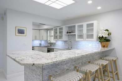 This beautiful home boasts two bedrooms and two baths, with the - photo 6