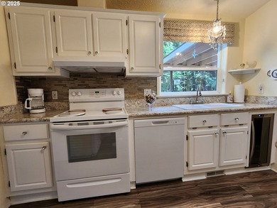 Beautifully remodeled home loaded with quality upgrades, tucked - photo 8