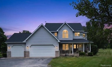 Spacious Fenton home with Hartland Schools set on 2.83 rolling - photo 1